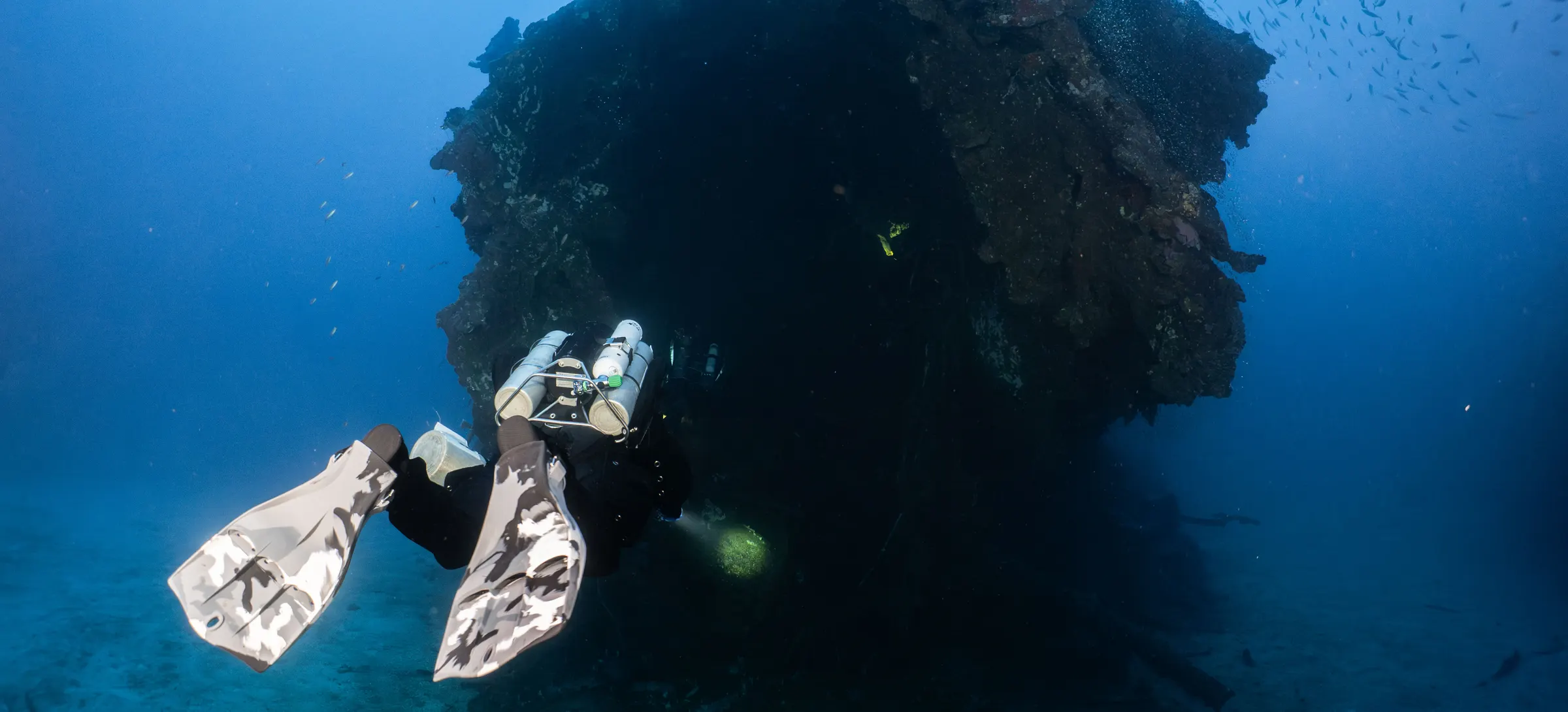 Technical diver approaching a shipwreck